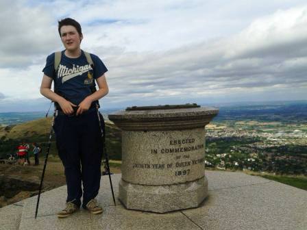 Liam by the Victoria memorial on summit