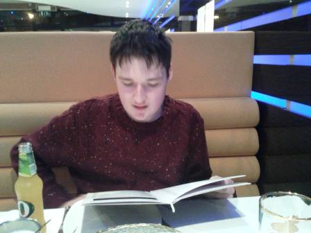 Liam studying the menu