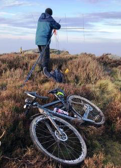 Setting up the beam.  The bike belongs to Richard G3CWI who was taking the photo.