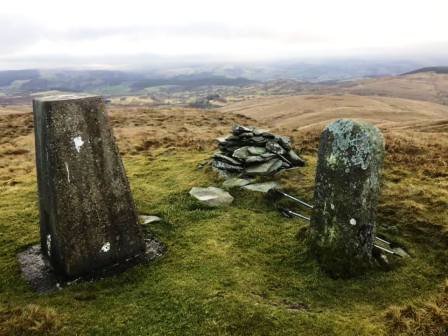 Trig point, cairn and marker stone on Foel Goch
