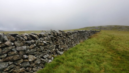The summit ridge defined by a wall