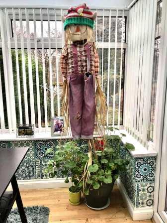 Christmas scarecrow in the conservatory!