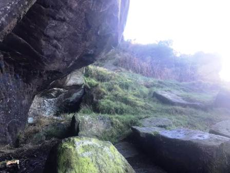Using the sheltered spot under the rocks
