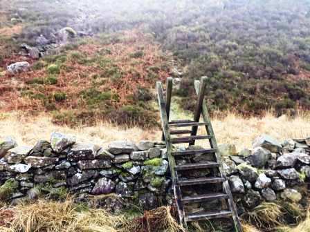 Ladder stile towards the steep ascent