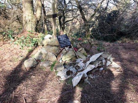 Aeroplane wreckage and memorial at summit