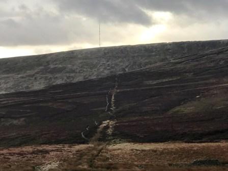 Pennine Way up Black Hill, Holme Moss transmitter mast on the horizon