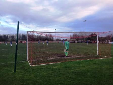 Watching from behind the goal