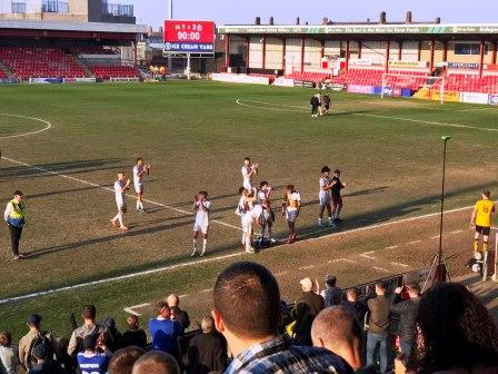 Macc players acknowledging the crowd