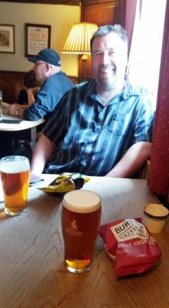 Tom M1EYP relaxing with a pint