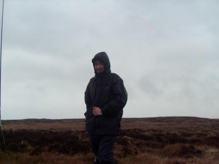 Jimmy on the summit plateau, with HF aerial above