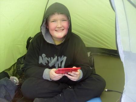 Liam playing DS in the tent