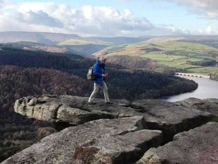 Marianne on Bamford Edge, Ladybower Reservoir in the background