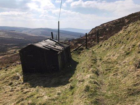 Continue past the farm buildings