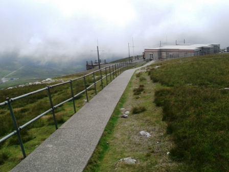 Pavement between the summit trig and the cafe
