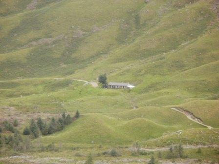 A zoomed shot of the hostel from high up on Black Sail Pass