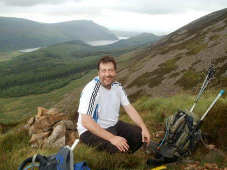 Rest stop halfway up Red Pike:  Tom, with Ennerdale in background