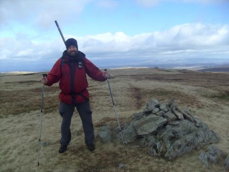 Tom M1EYP at the summit cairn