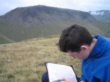 Jimmy studies the map during the descent