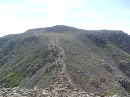 Looking back to the summit after the initial descent