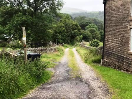 Footpath into the countryside out of Kettleshulme