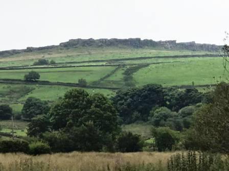 Windgather Rocks towering above