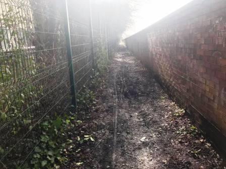 Path continues down a long narrow alleyway, sandiwched between Hurdsfield Industrial Estate on the left and the Silk Road on the right