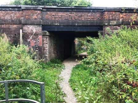 Passing under the railway on the edge of the village