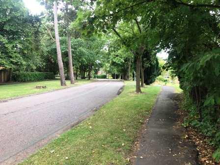 Continue along Carter Lane, past residential houses