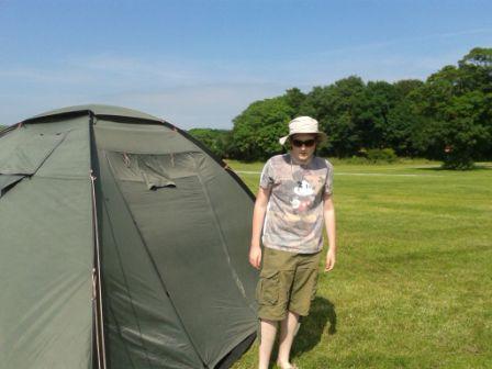 Liam with the just-erected tent in Union Mills
