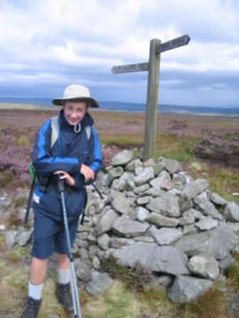 Fingerpost and cairn on Lough Shaw