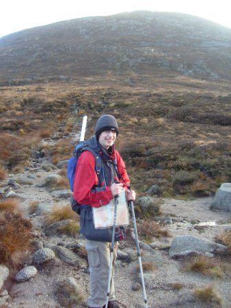 Jimmy anticipating Slievelamagan from the saddle with Slieve Binnian