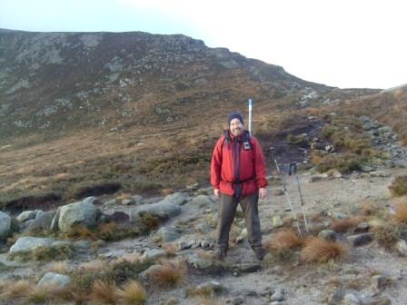 Tom at the saddle, with the Slieve Binnian path behind