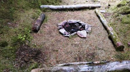 Firepit in the woods near the summit