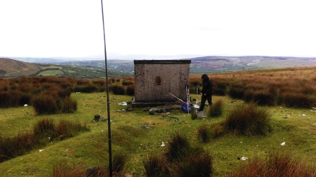 Setting up by the ruined concrete hut near the summit