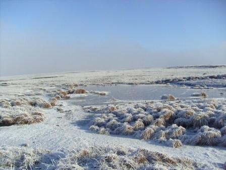 A frozen tarn as we approached the summit