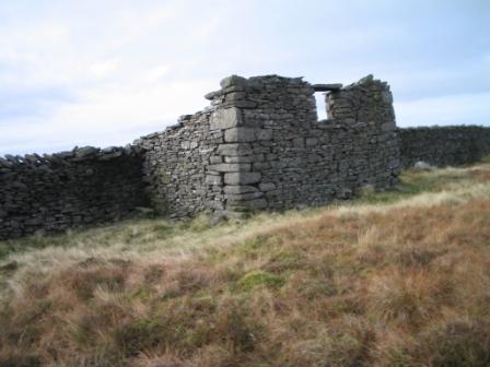 Old stone building on the summit ridge