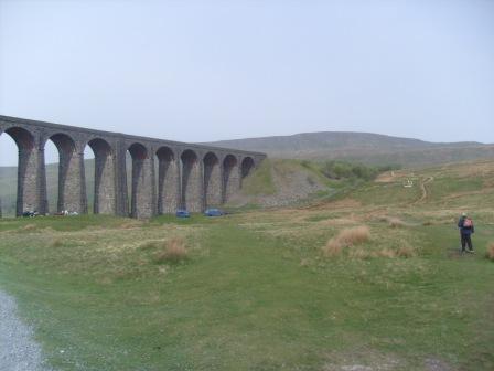 Liam begins his ascent by the Ribblehead Viaduct