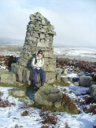 Lewis by the large stone cairn