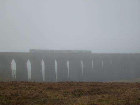 A train passes over the Ribblehead Viaduct on the Settle-Carlisle railway