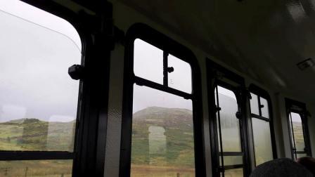 Wet weather outside the ascending train