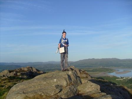 Jimmy tries another rock that might be higher than the trig base!