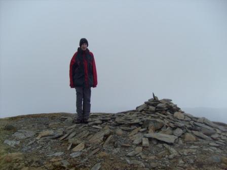 Jimmy attains the summit cairn
