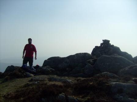 Tom attains the summit