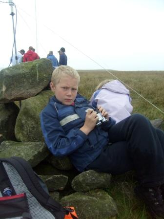 Daniel (son of M0GIA) relaxes by the cairn