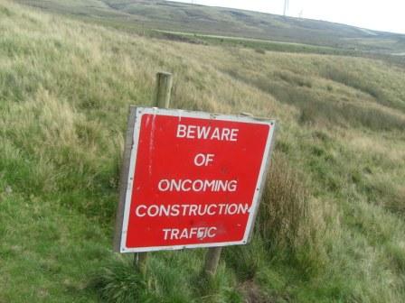 One of many ugly warning signs in the vicinity of the summit