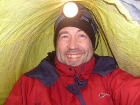 Tom M1EYP/P operating by torchlight inside the bothy bag - looking tired?