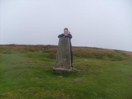 Craig looks pleased to have summited