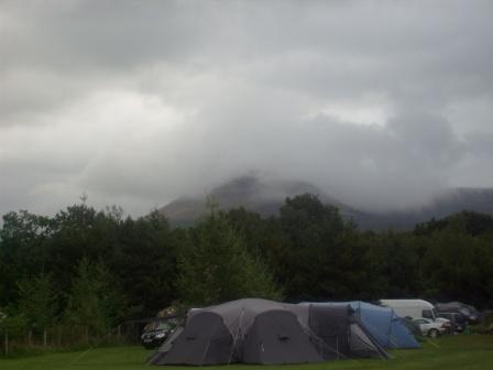 Mynydd Troed towering above the campsite on a gloomy morning