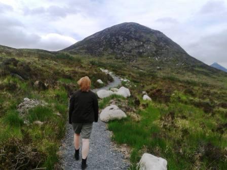 Marianne on the walking trail, with Slievenaglogh ahead