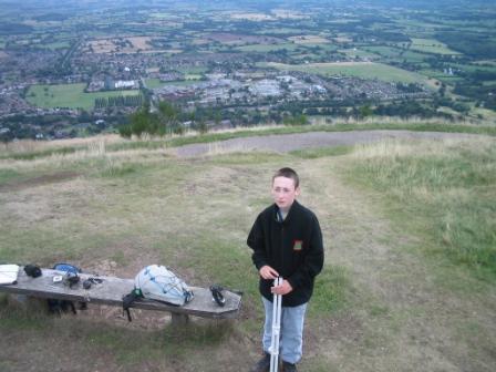 Jimmy prepares the antenna with Great Malvern in the background below